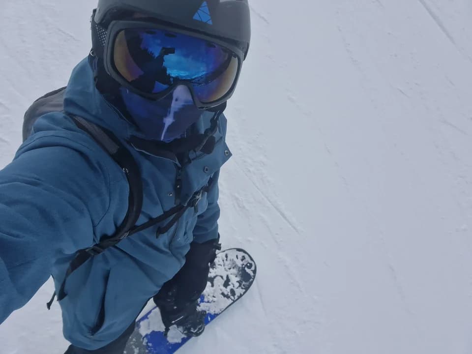 Snowboarding on a snowy mountain